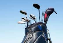 Golf und Gesundheit: Meine Top 10, warum Golf Wohlbefinden fördert Mit Schlägern gefülltes Golfbag vor Himmel