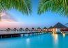 Luxury Escapes Gutscheincode: 10% Rabatt auf deinen nächsten Traumurlaub sichern Luxus Resort mit Meer und Palmen
