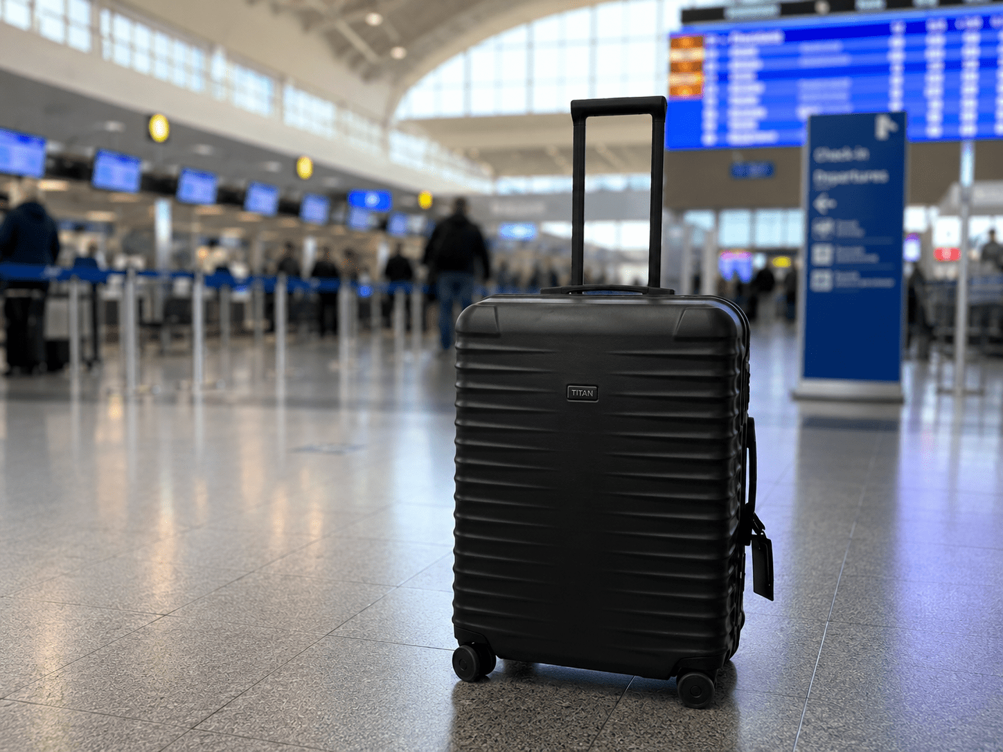 TITAN Koffer gepackt für eine Golfreise